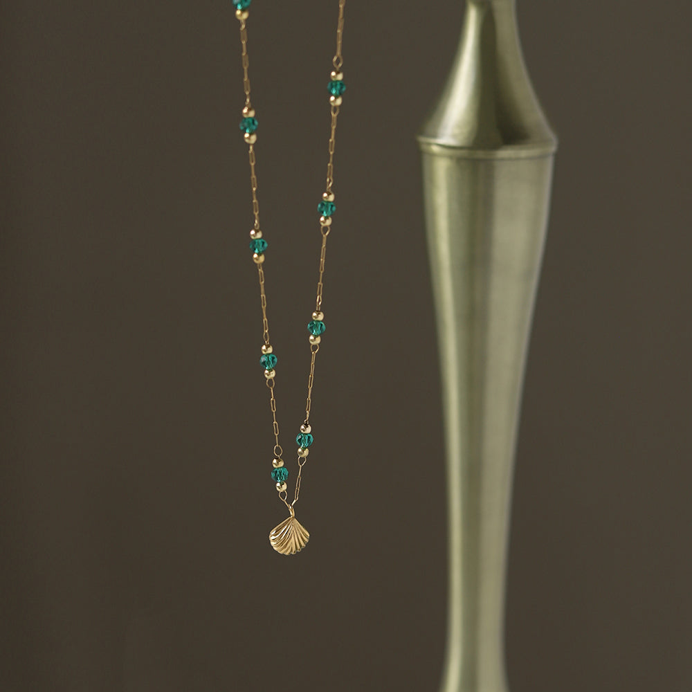 Delicate Gold-Plated Shell Pendant Necklace with Green Glass Beads