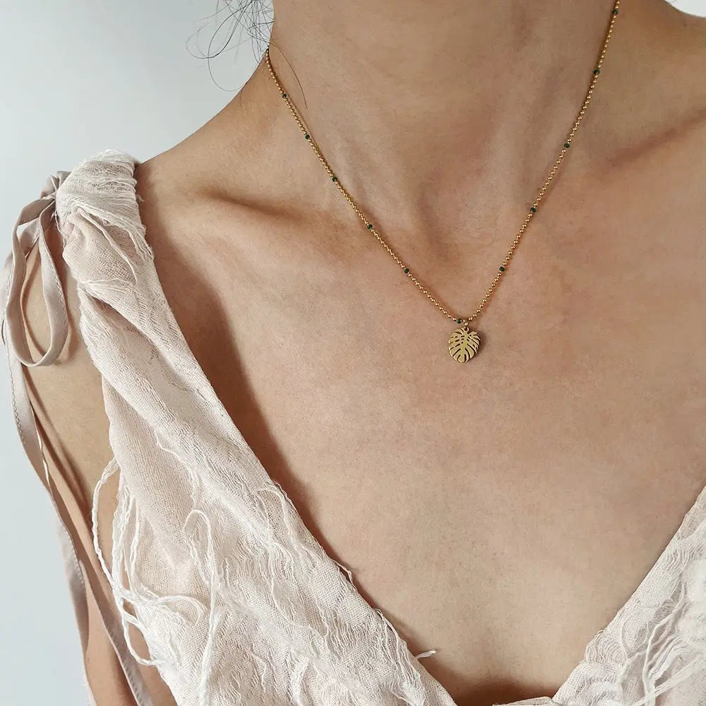 Tropical Botanical Leaf Beaded Necklace in Gold-Plated Titanium Steel Crushes.