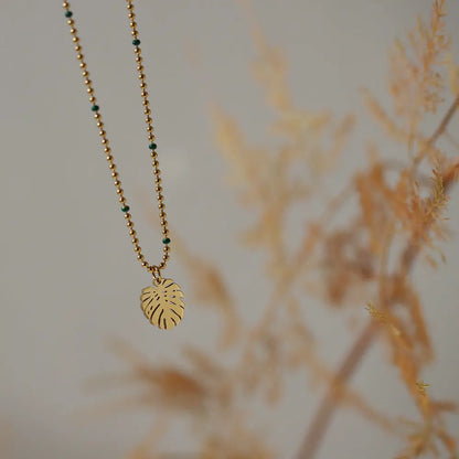 Tropical Botanical Leaf Beaded Necklace in Gold-Plated Titanium Steel Crushes.