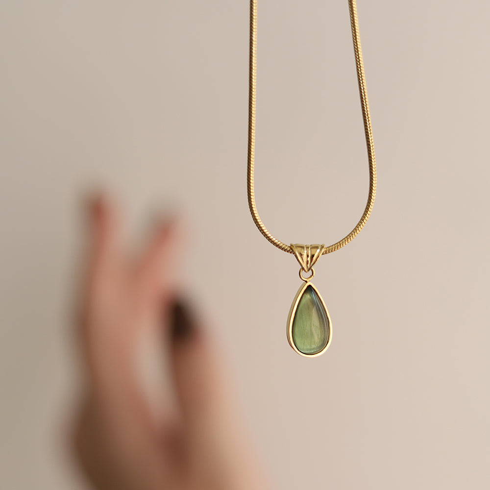 Gold-Plated Teardrop Pendant Necklace with Green Synthetic Cat Eye Stone