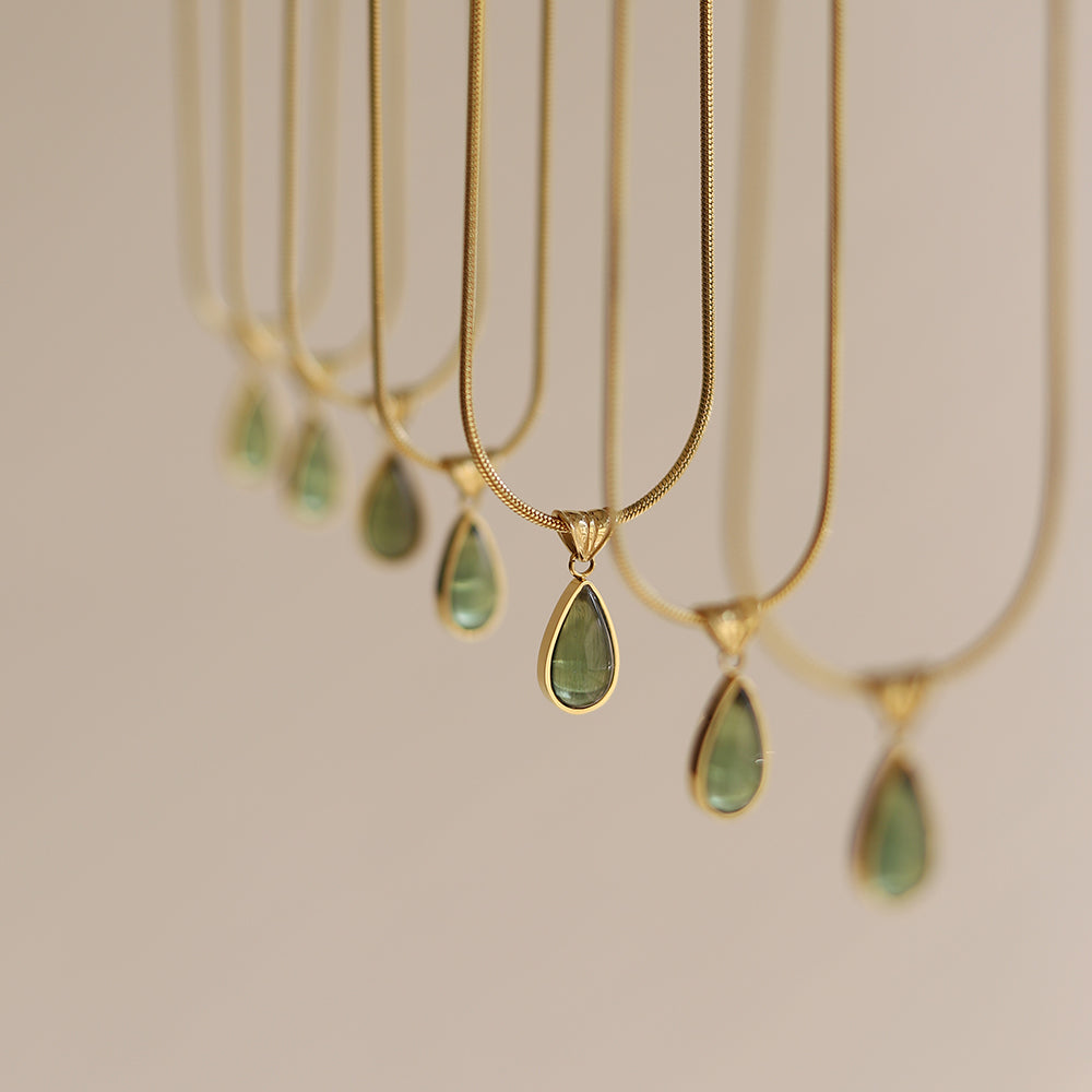 Gold-Plated Teardrop Pendant Necklace with Green Synthetic Cat Eye Stone